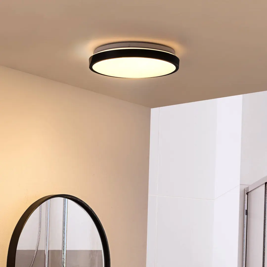 Lindby LED-Deckenlampe Medon Ø 29 cm schwarz Kunststoff IP44