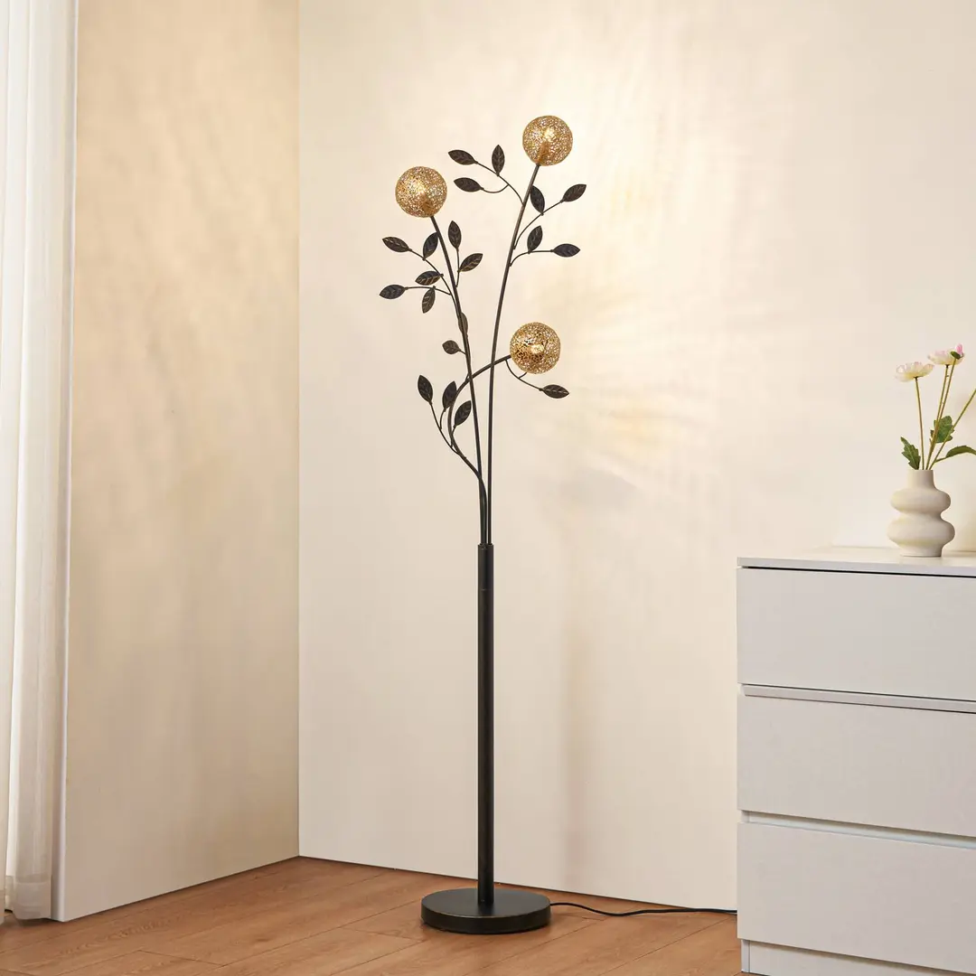 Lucande Stehleuchte Evory, 160 cm, 3-flg., schwarz/gold, G9