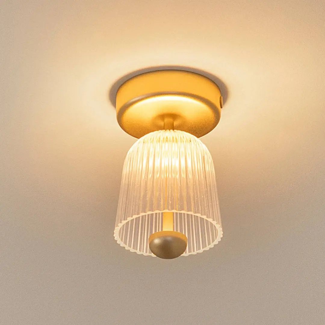 Nuura LED-Deckenlampe Asteea, Ø 12 cm, messingfarben/klar