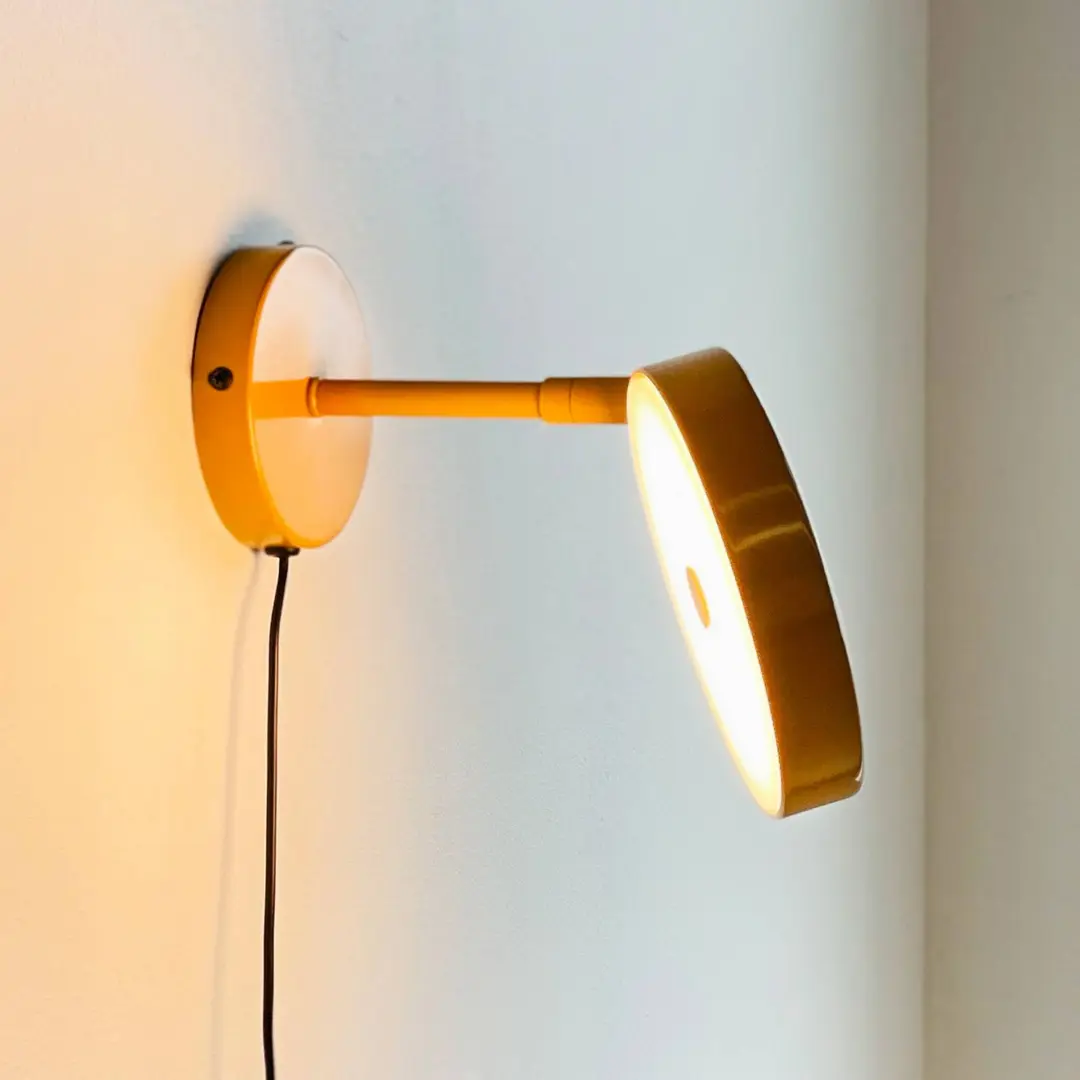 Dyberg Larsen LED-Wandlampe Starlight, gelb, Ø 14 cm, dim.
