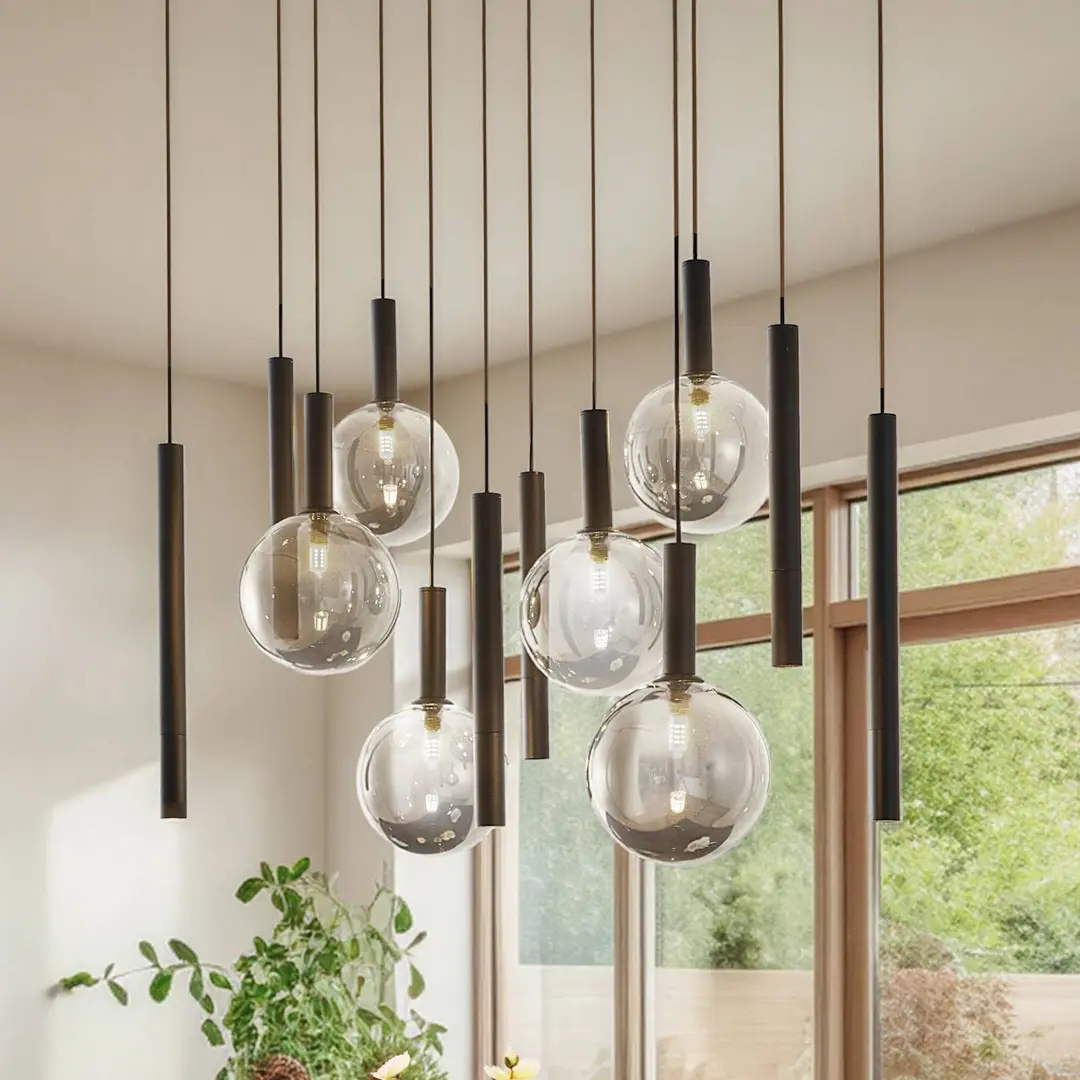 Lucande Hängeleuchte Lumavia, 12-flg, Glas, schwarz/klar, G9