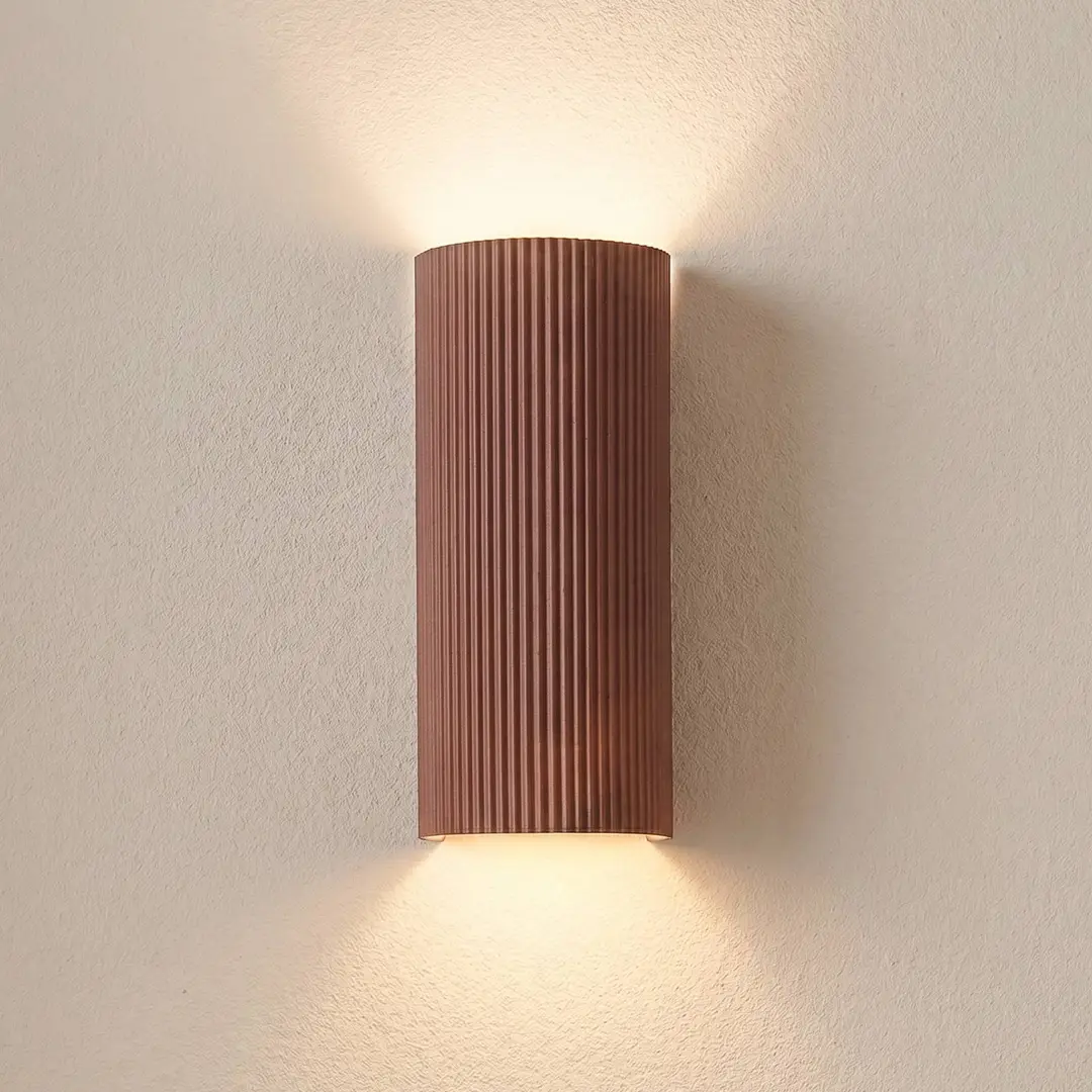 Lindby Wandleuchte Colja, braun, rund, Höhe 30,5 cm, Gips