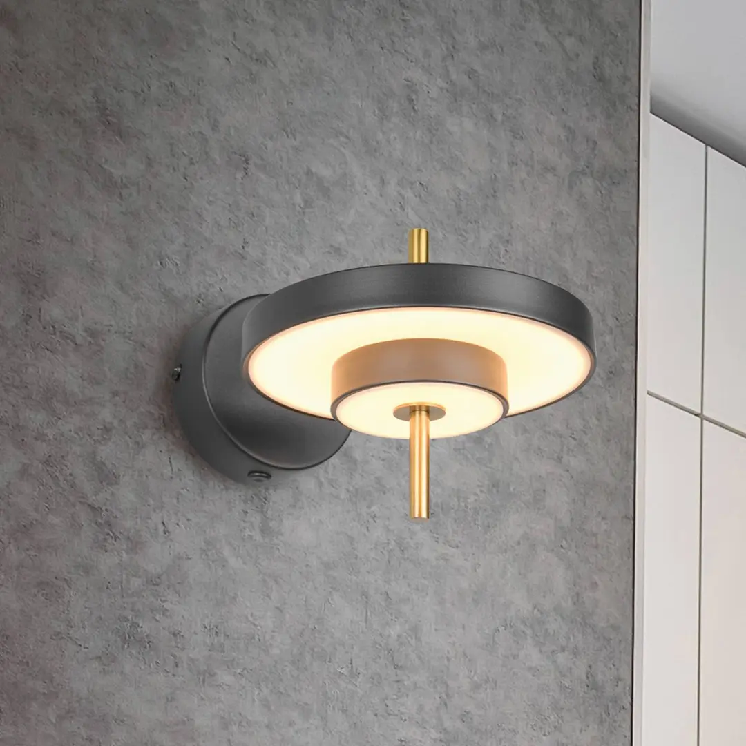 Trio Lighting LED-Wandlampe Keaton, schwarz/goldfarben Ø 20 cm Metall, CCT