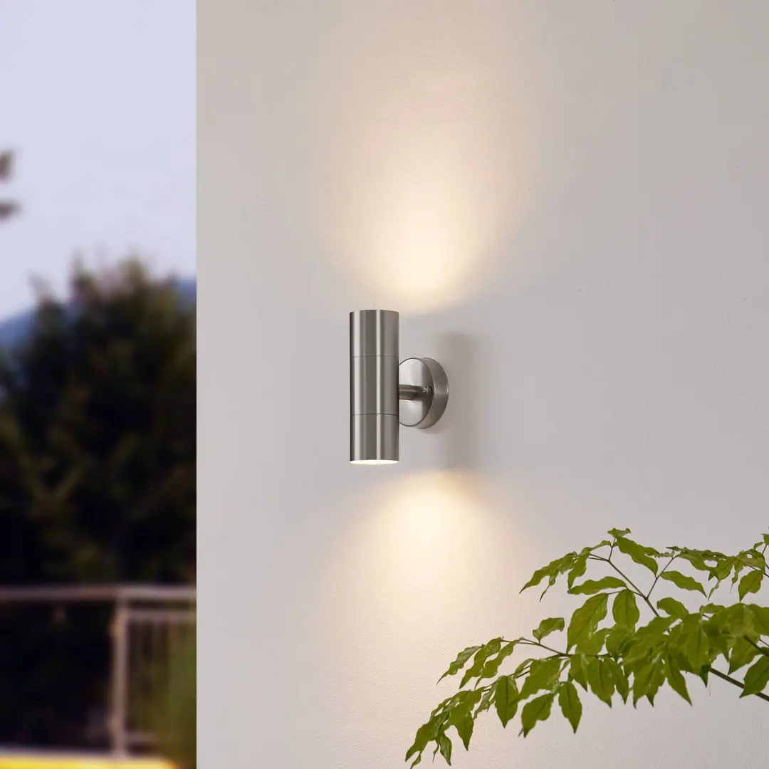 Lindby Außenwandlampe Hakan, up/down, Edelstahl, IP44, GU10