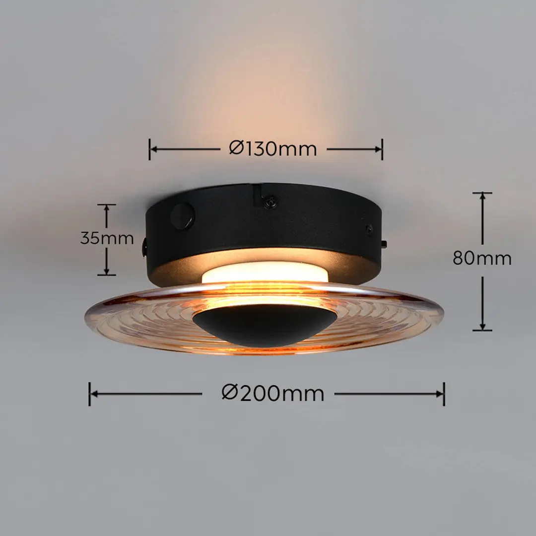Trio Lighting LED-Wandlampe Sirena, schwarz/amber, Ø 20 cm, Glas, CCT