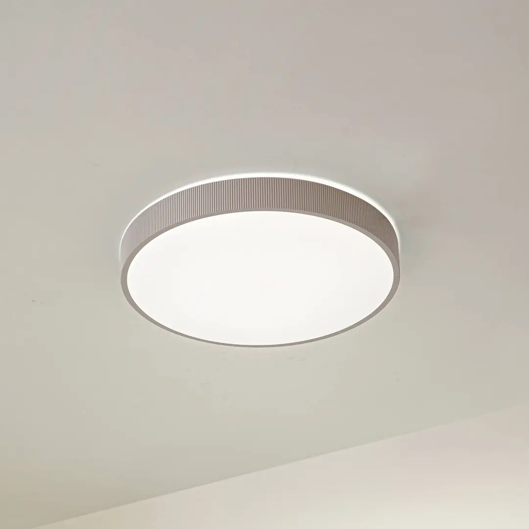 Lindby LED-Deckenleuchte Zylo, taupe, Ø49 cm, CCT dimmbar