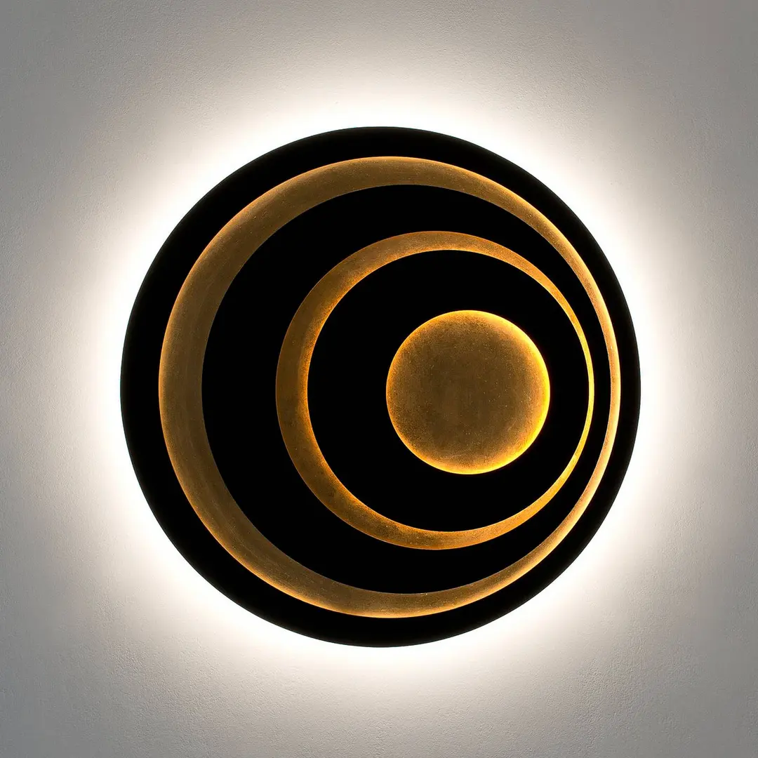 Holländer LED-Wandleuchte GRAVION, schwarz/gold, Ø 80 cm, Metall, dim