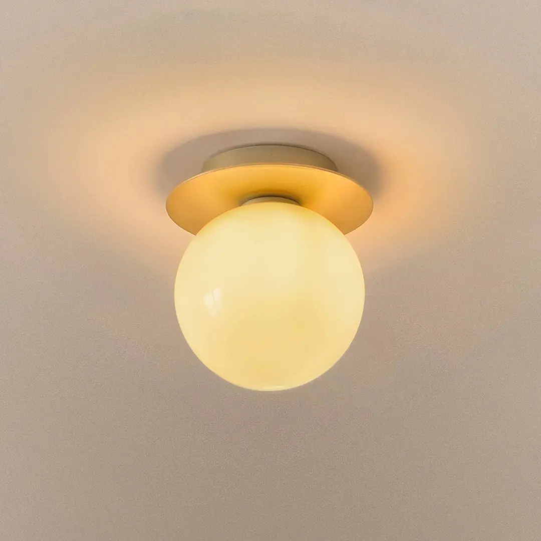 Nuura Wandleuchte Liila 1 Medium, gold/honiggelb, IP44, G9