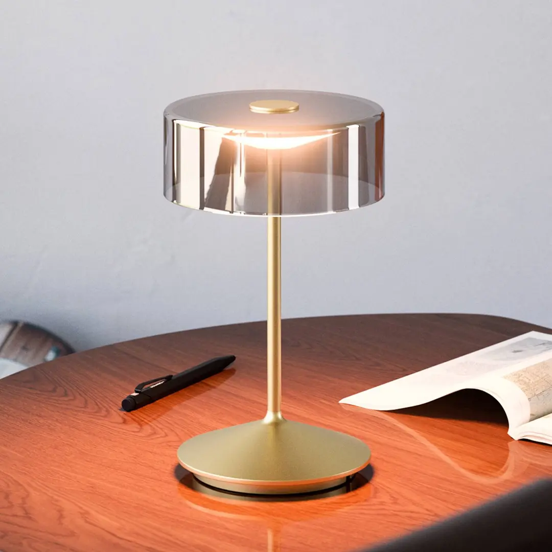 Sigor LED-Akkutischleuchte Numotion, gold, Glas, IP54, dimmbar